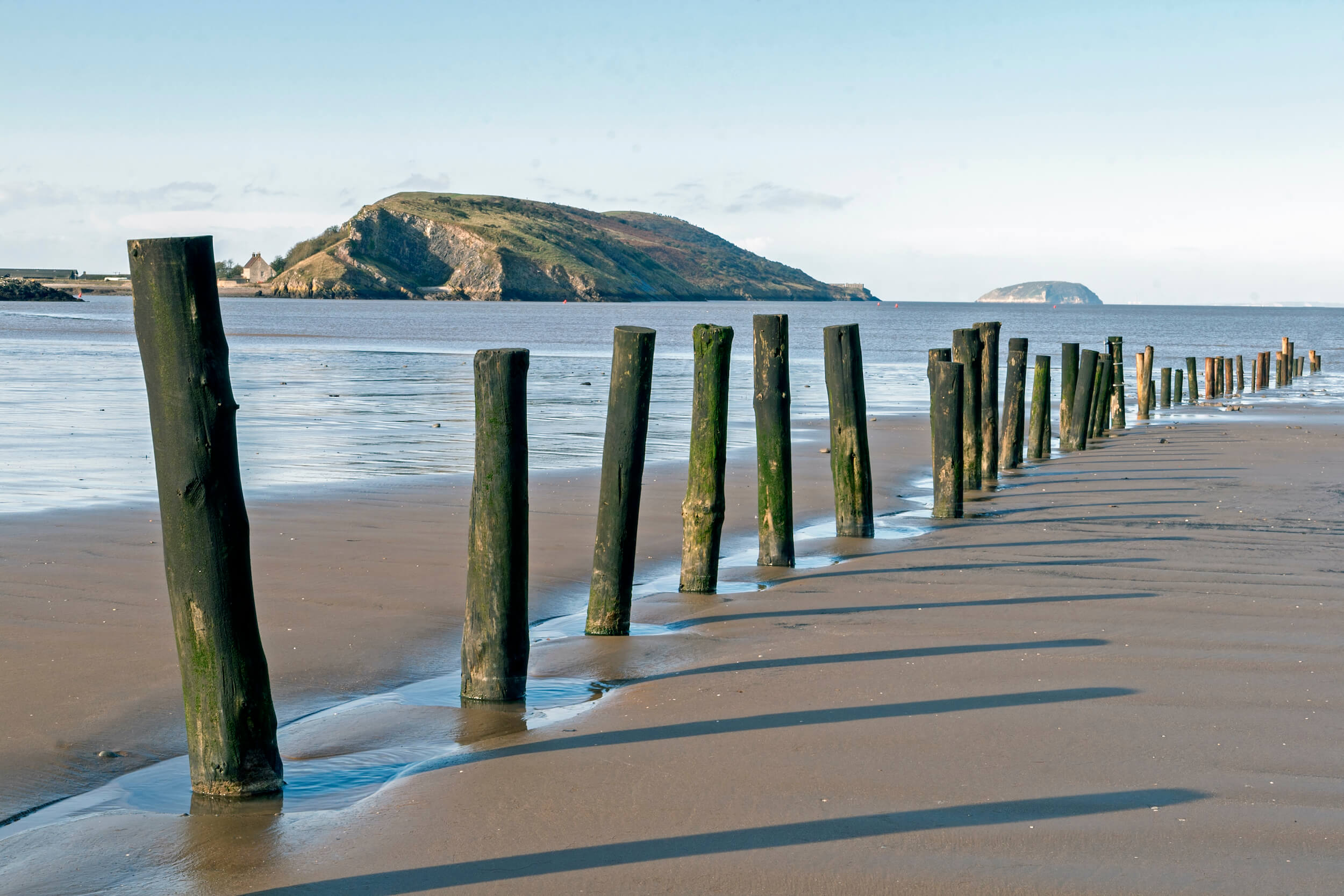 Row of groynes on the beach at Weston-super-Mare